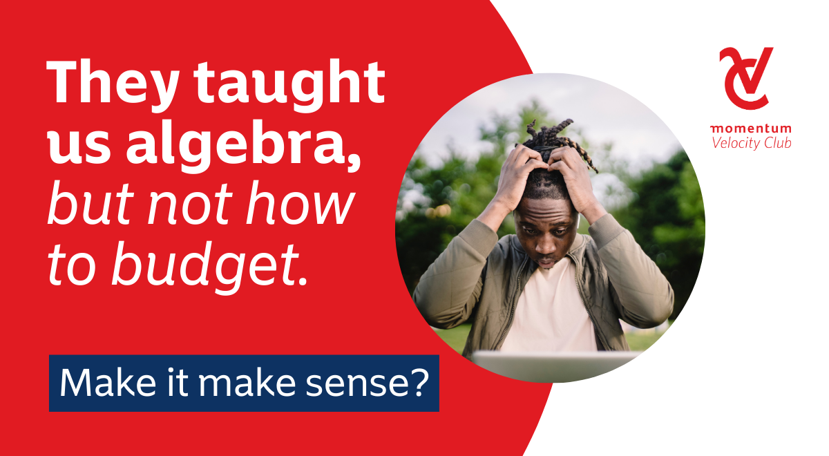 A man sits with his head in his hands, clearly worried about his finances. 